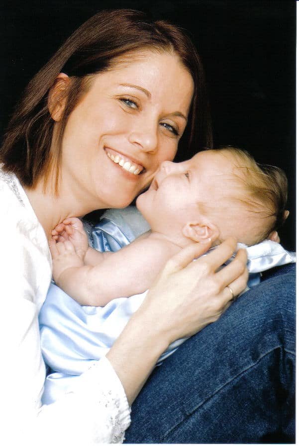 a mom and her son smiling...