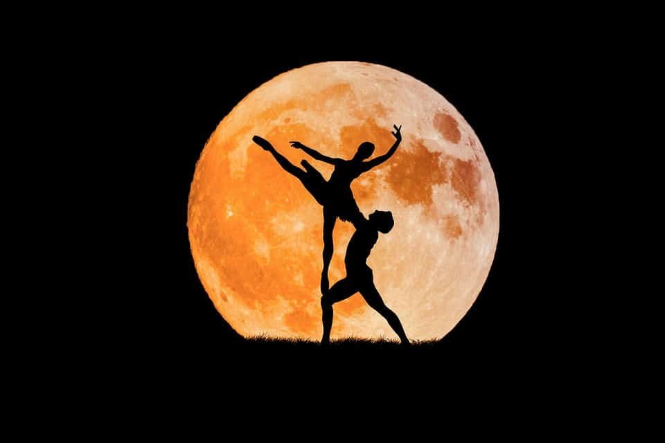 friendship:  a silhouette of a ballet couple against a full moon...